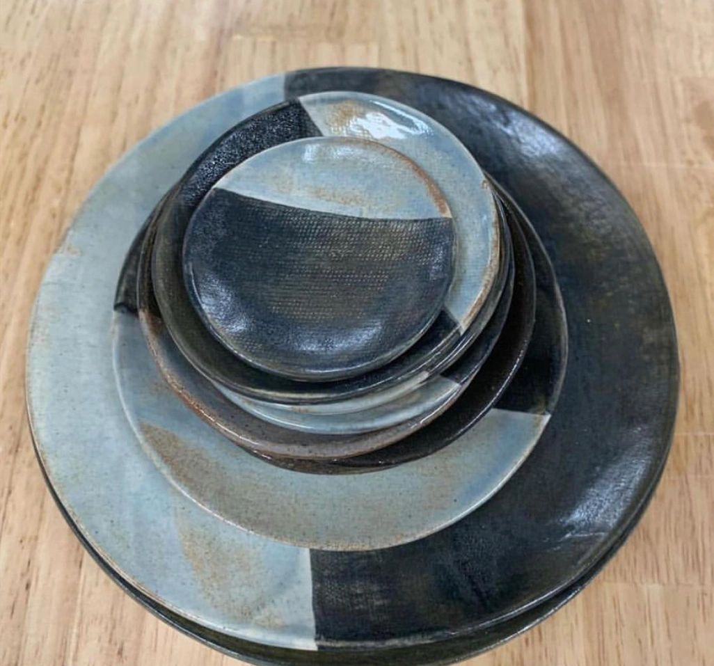 Black and gray ceramic plates